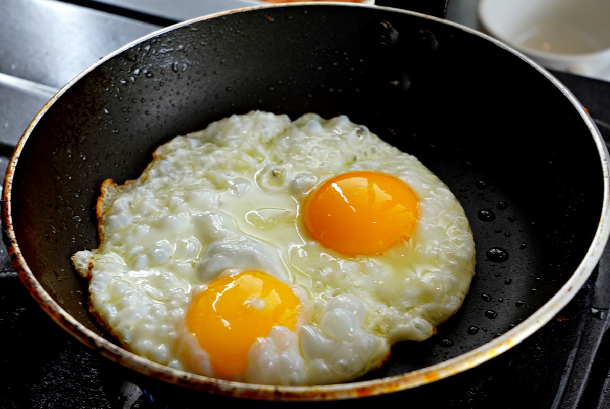 Person preparing a healthy meal in kitchen